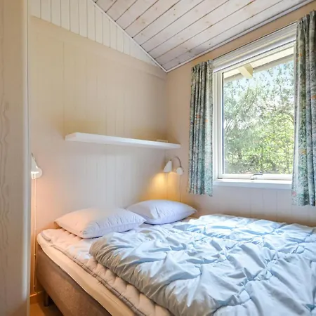 Semesterbostad Skovskaden Romo *